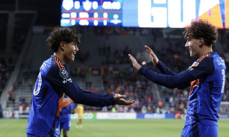 Ademar Cjhavez and Stefan Chirila celebrate a goal.